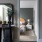 bed in bedroom framed by door